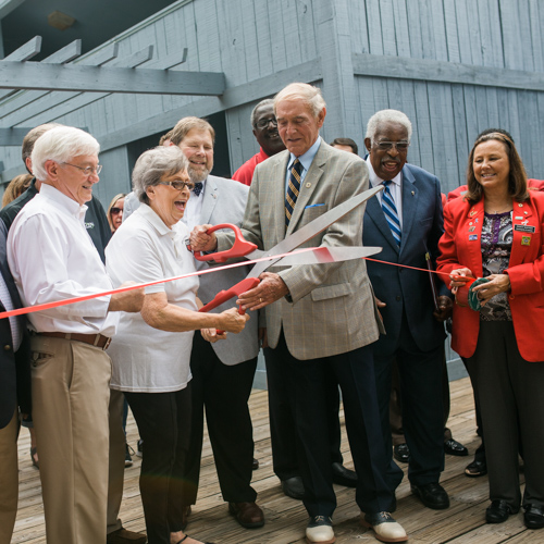 Sponsors cut the ribbon at the dedication of the new Nature Studies Building at Cypress Grove Nature Park in Jackson. (Photo by Kristi Woody)